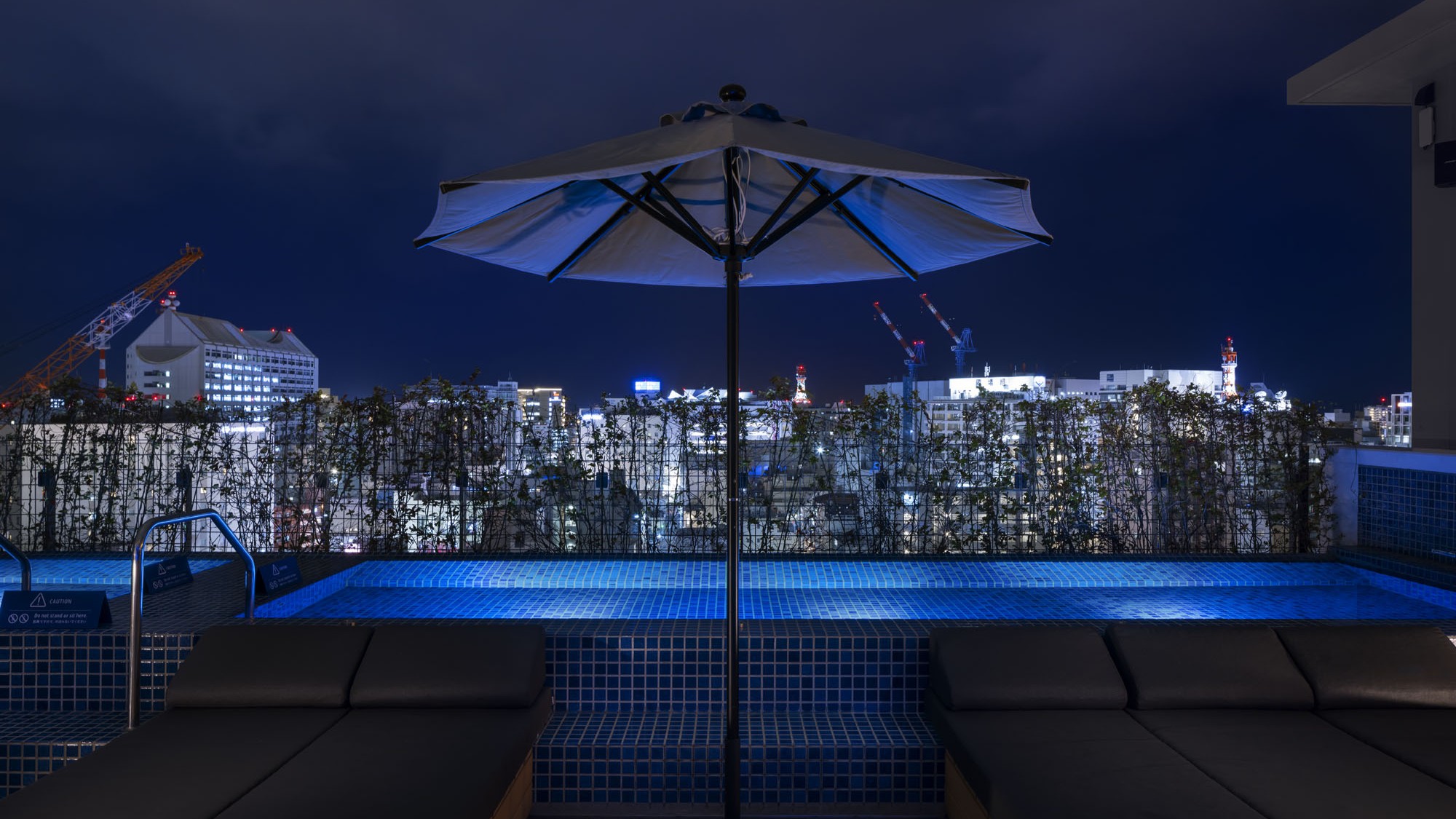 Southwest Grand Hotel — 那覇・牧志 · 2023年開業、最上階にサンセットバーを持つ都市プレミアムホテル